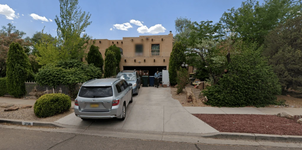 cars parked outside house